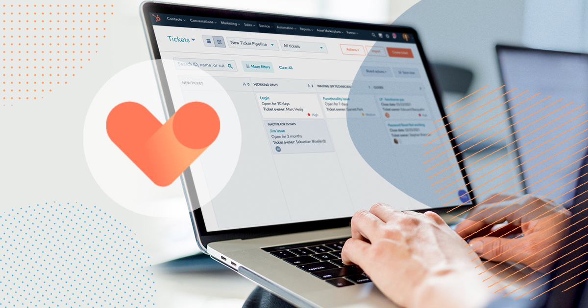 person on keyboard using marketing hub and tickets system